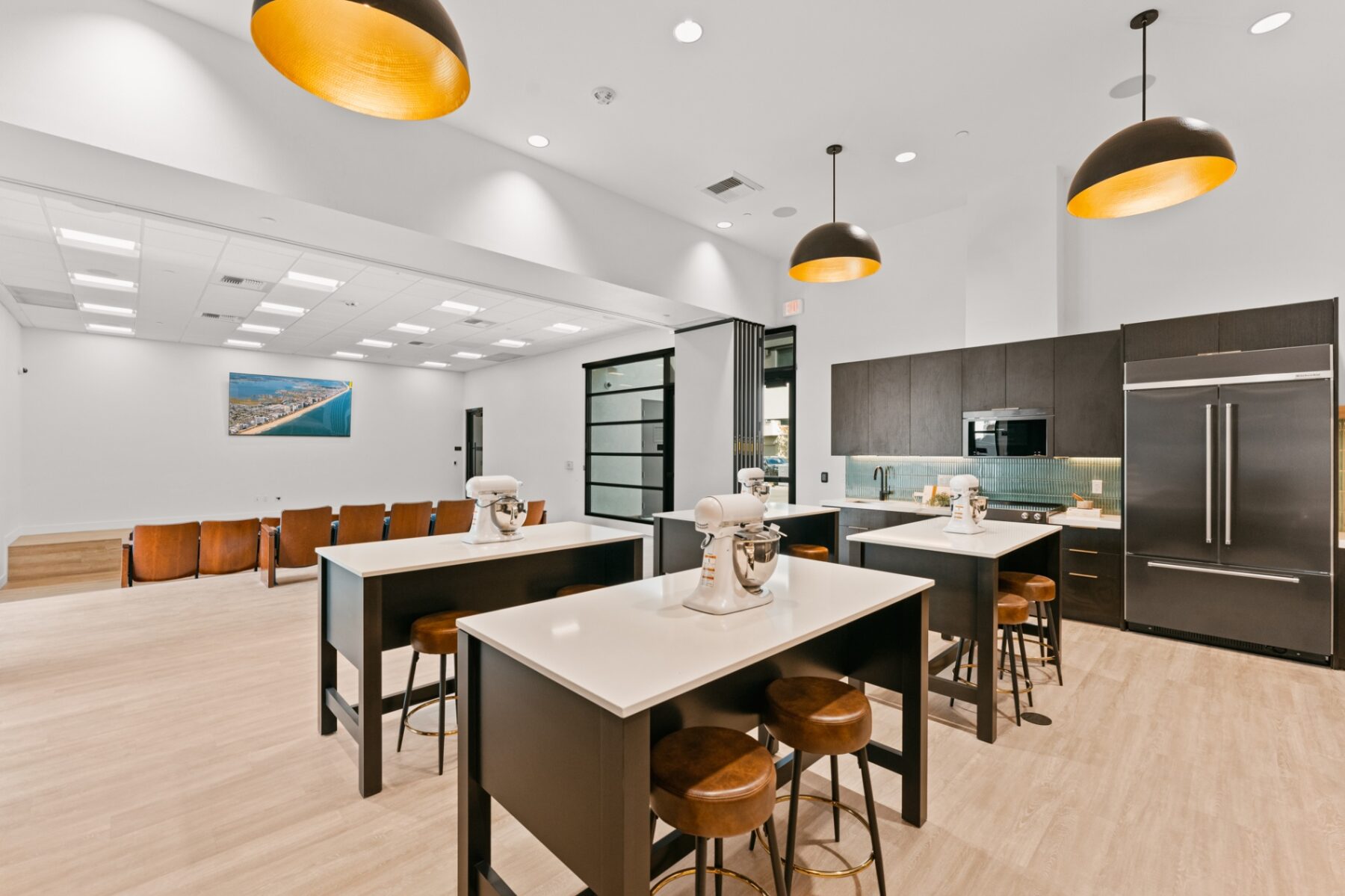 Culinary with white counters, black cabinets, and stainless steel appliances